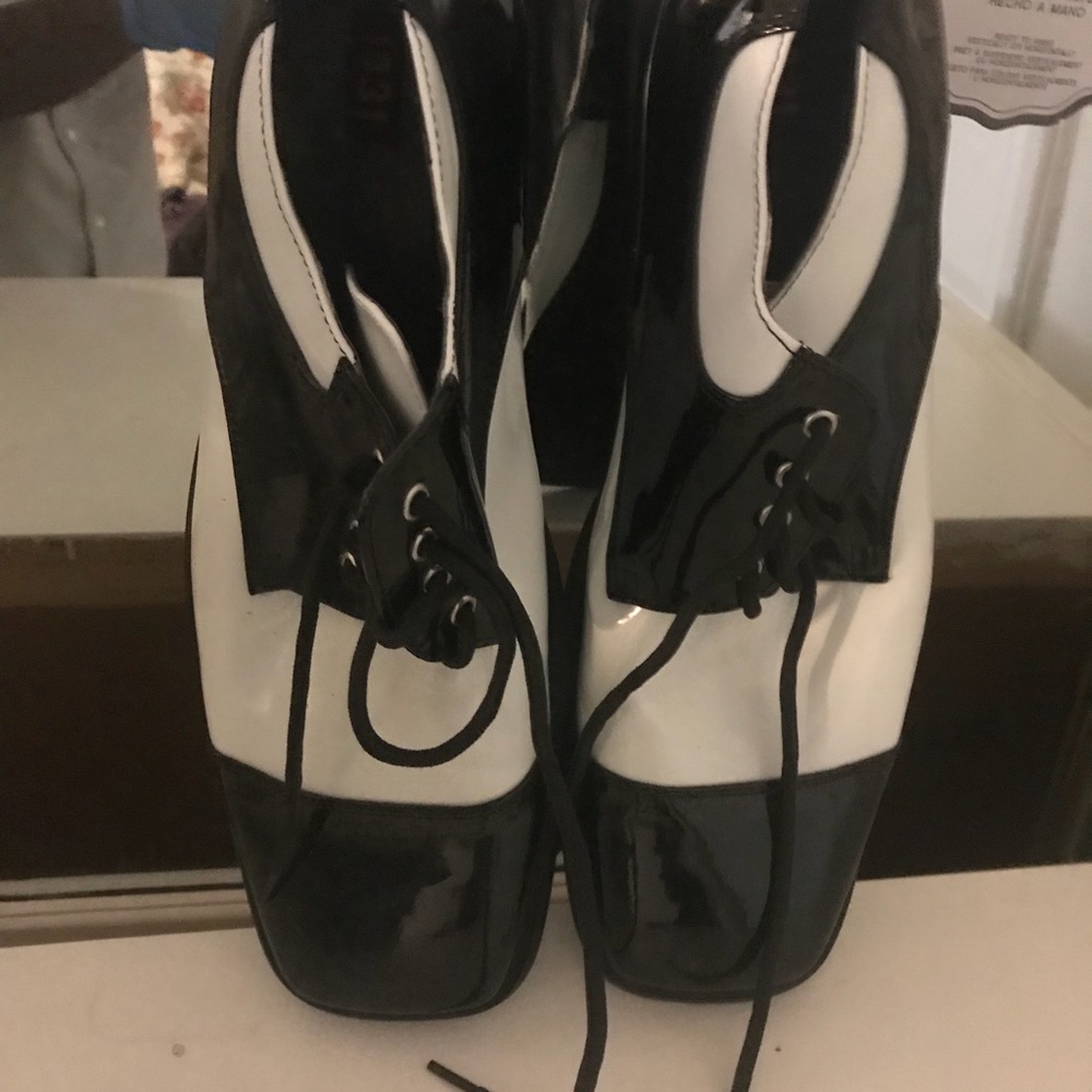 Man black and white patent leather